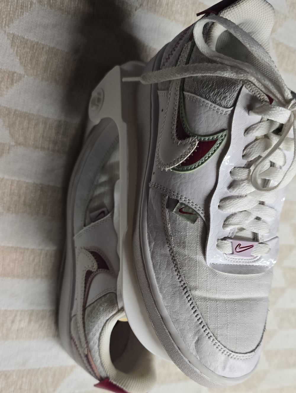 Nike Men’s White Sneakers with Burgundy and Light Green Accents